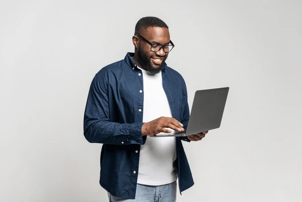 Man sitting at a desk with the sun rising