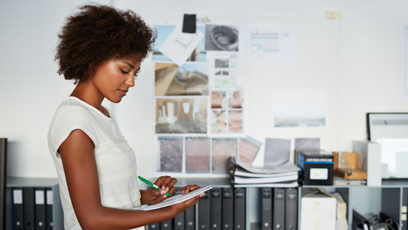 close up of a woman's hand using a mouse