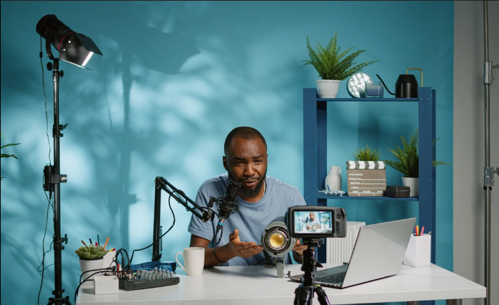 people sitting at at desk smiling